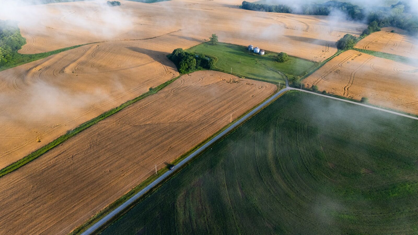 Aerial view of Midwest farmland during harvest season